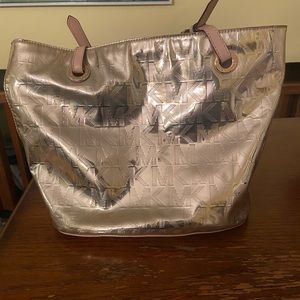 Gold metallic Michael kors tote.